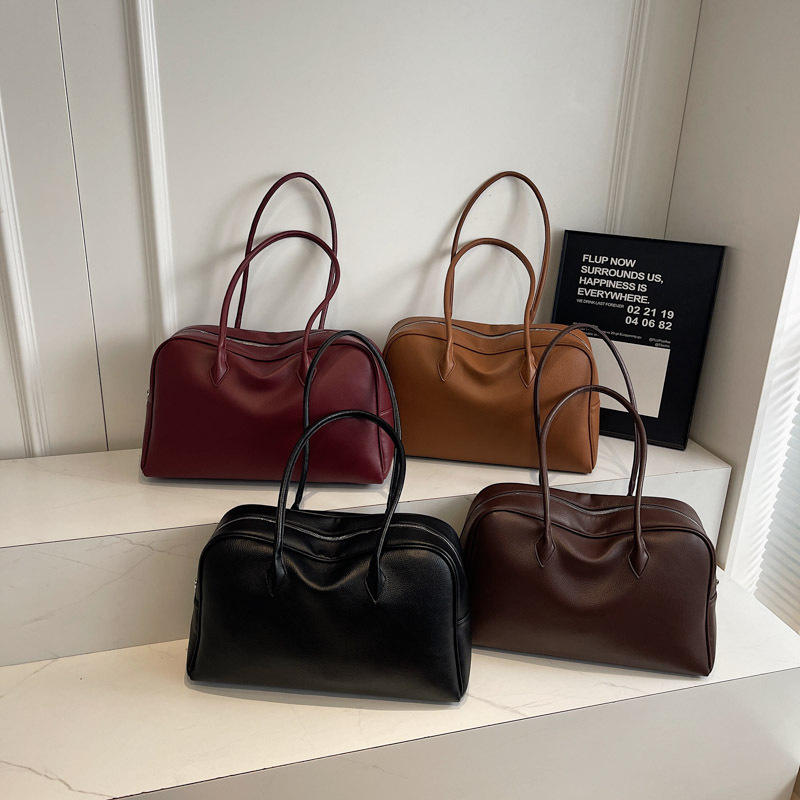 Aria | Schultertasche im Bowling-Stil
